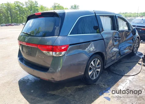 2014 Honda Odyssey Touring/Touring Elite z USA, uszkodzony, nr VIN 5FNRL5H97EB026053